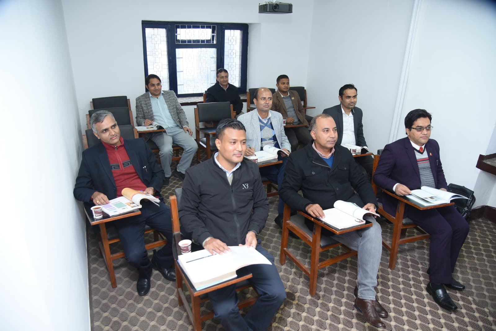 Working professionals in an MBA Executive class at Management Development Campus